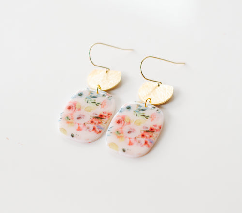 floral dangles with brass charm tops