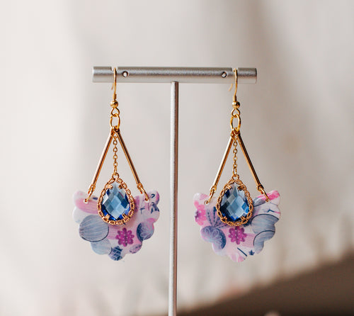 Crystal dangles with matching blue charm
