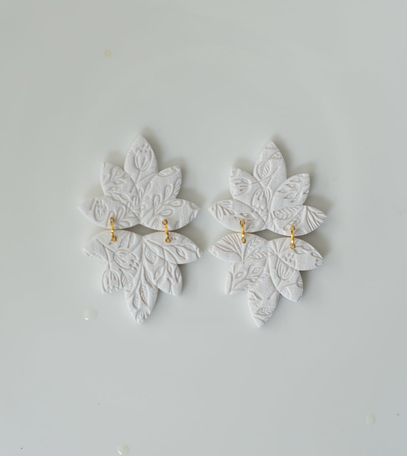 White lotus dangles