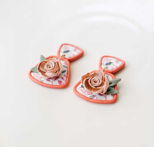 Dangle earrings in pinks and greens w/cream rose