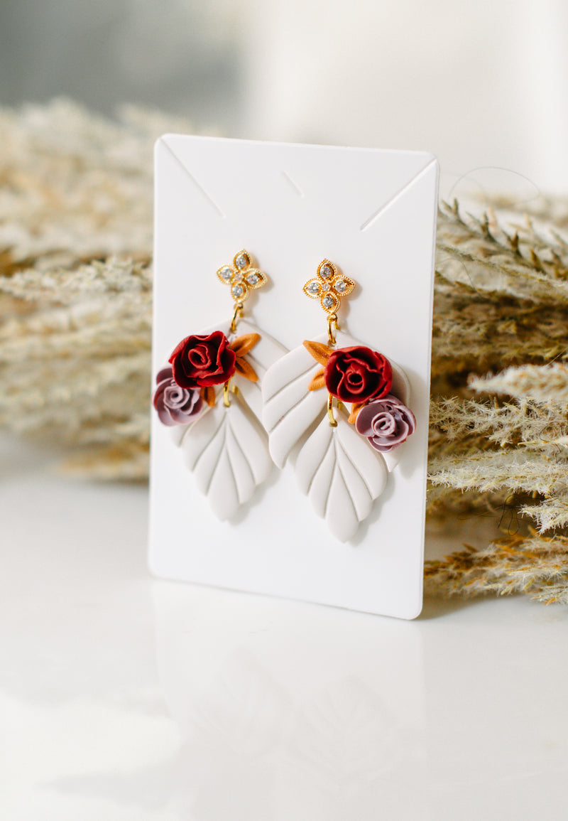 Cream color floral dangles w/gem tops