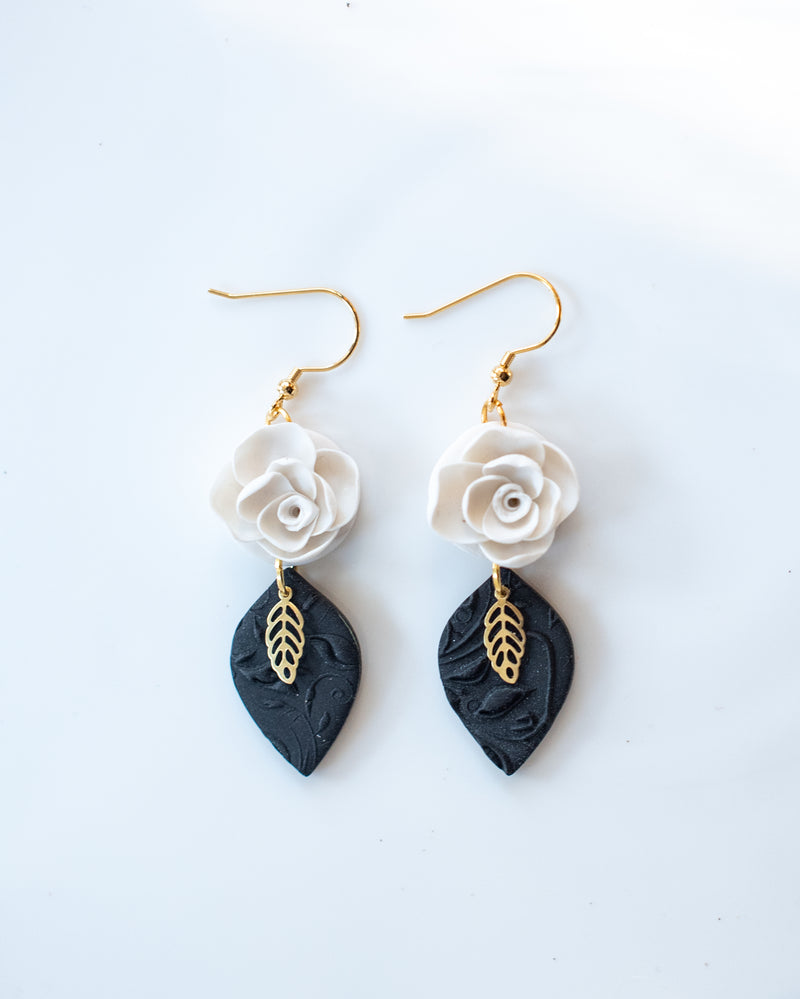 Black and white floral dangles