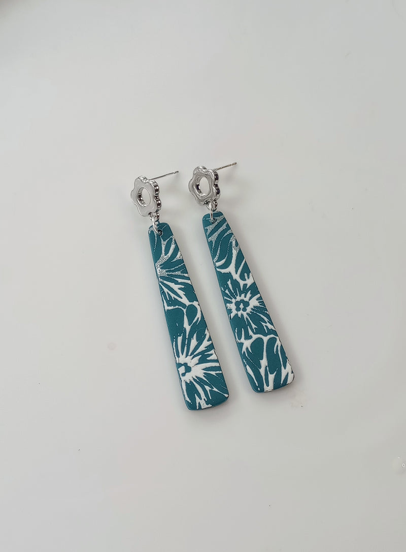 Dark teal floral dangles w/silver flower tops