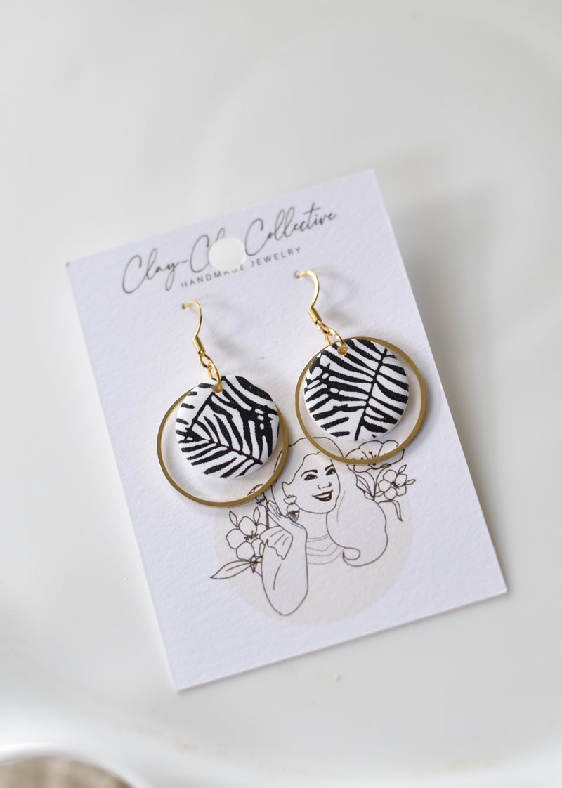 Black and white palm leaves circle hoops